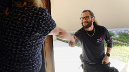 Infinity AC of Austin greeting homeowner