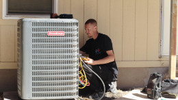 Frank, an Infinity AC of Austin tech, repairing a system