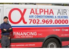 AC repair technician standing in front of Alpha Air repair van showcasing the Financing options our customers have available to them.